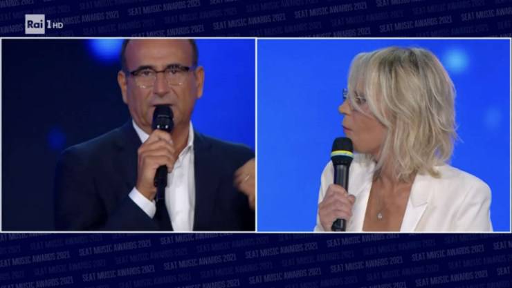 Carlo Conti e Maria De Filippi in collegamento 